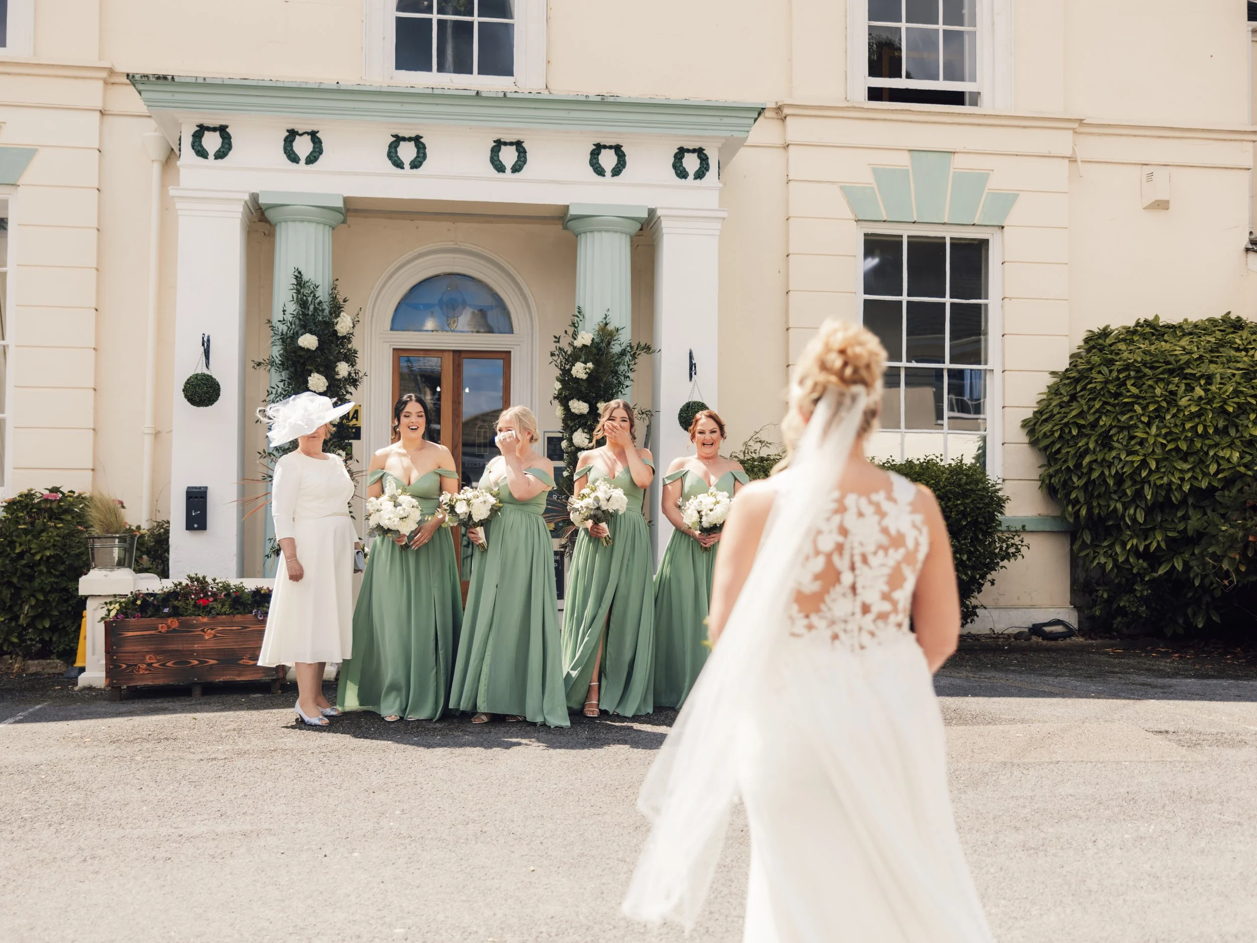 Wedding party outside the Georgian entrance of Norton House Hotel