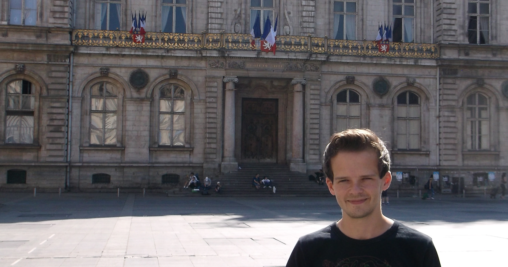 Matthew in front of the Hôtel de ville de Lyon