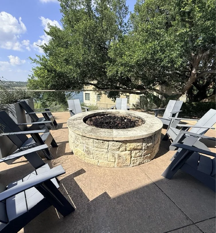 Outdoor fire pit and seating at Lakeway Resort