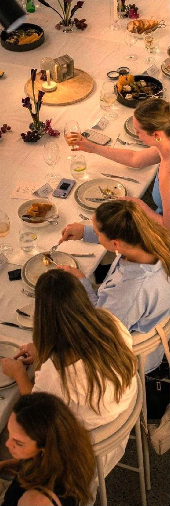 Guests dining together at a WellAF gathering