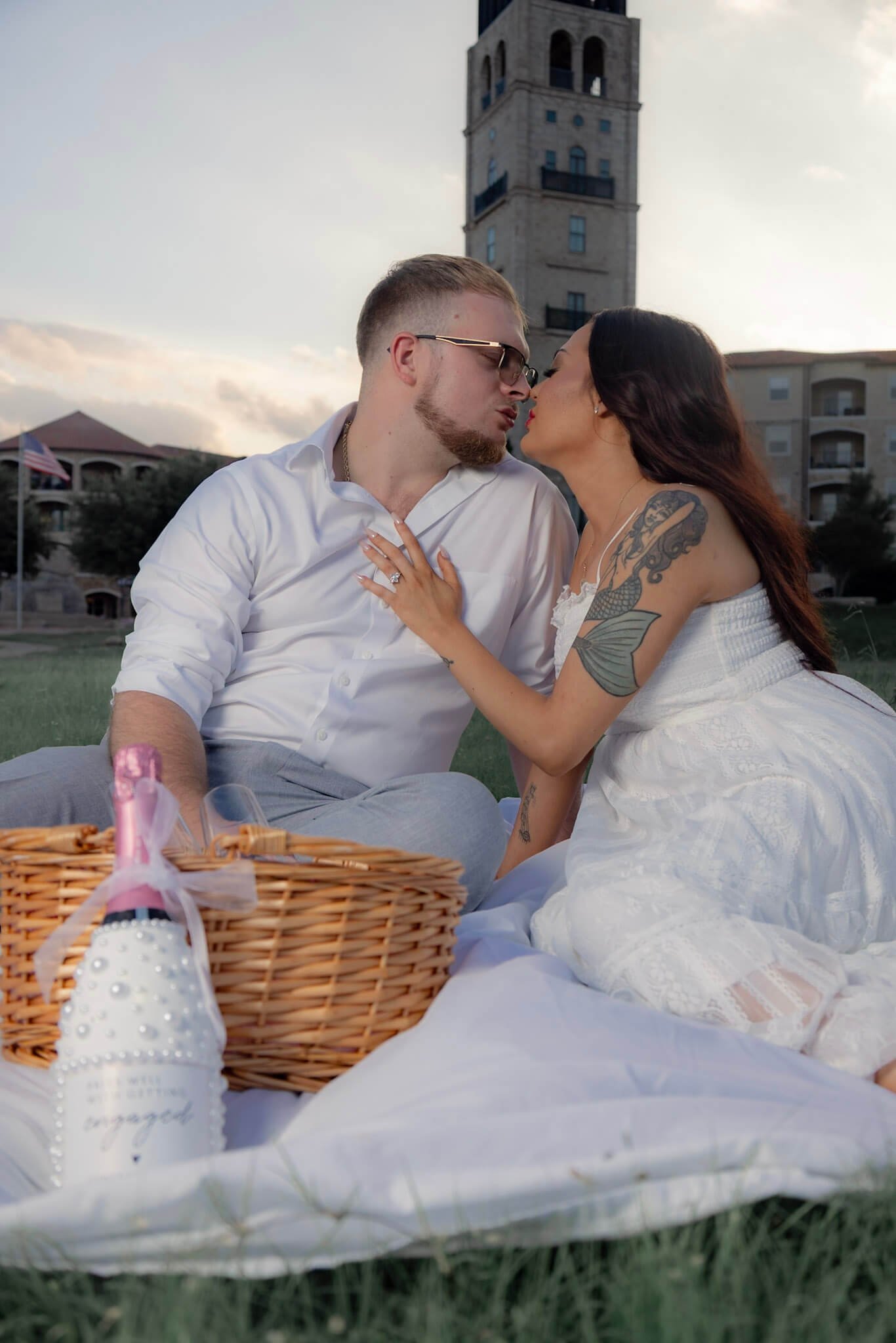 Couple relaxing together during a North Texas engagement portrait session