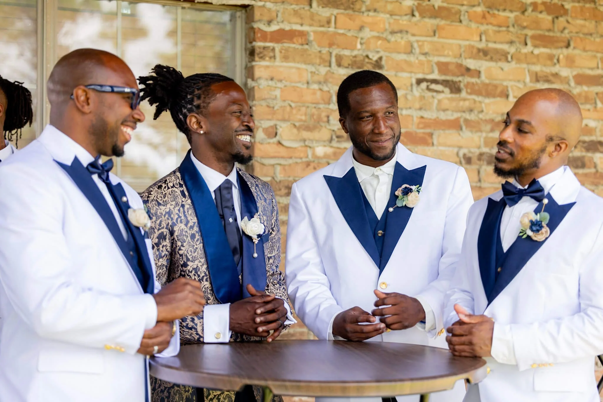 Wedding reception guests celebrating together photographed by BeeCaptured
