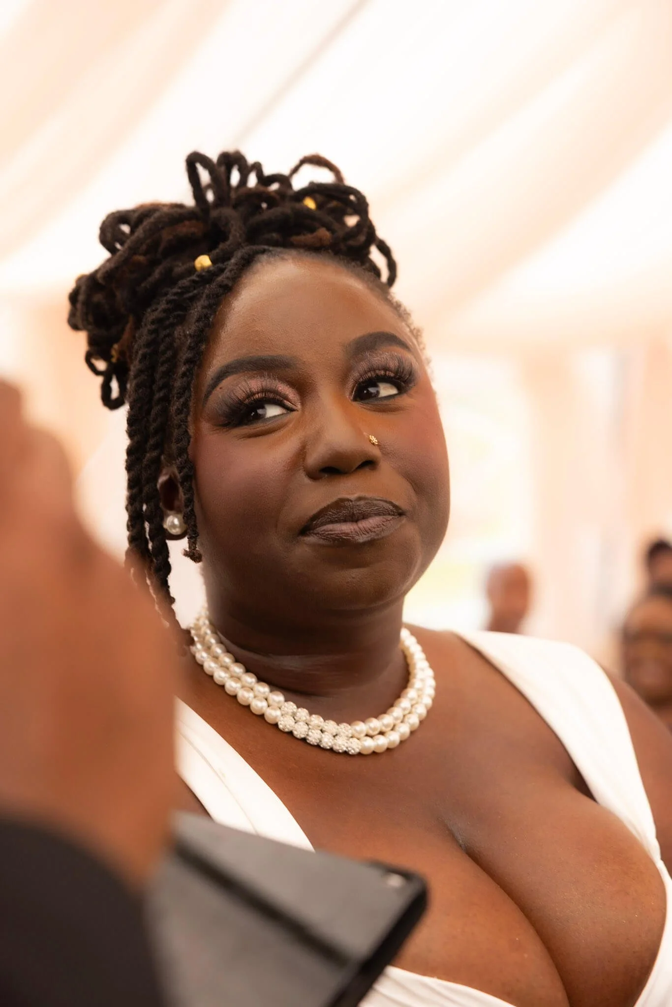 Candid wedding-day portrait of a bride photographed by BeeCaptured