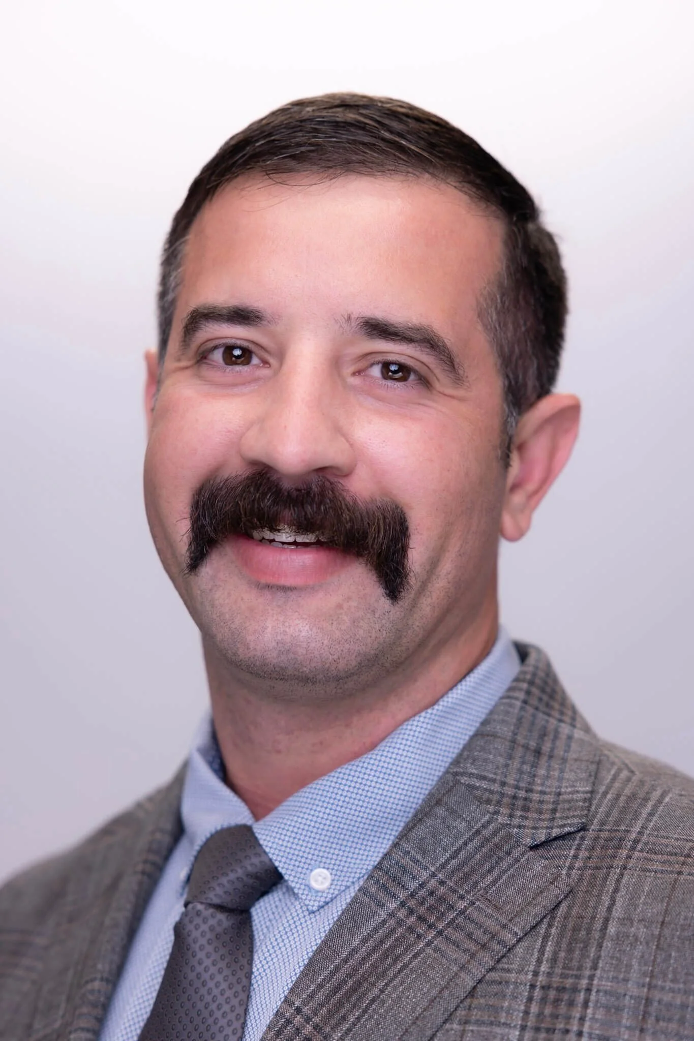 Consistent professional headshot for a conference attendee photographed by BeeCaptured