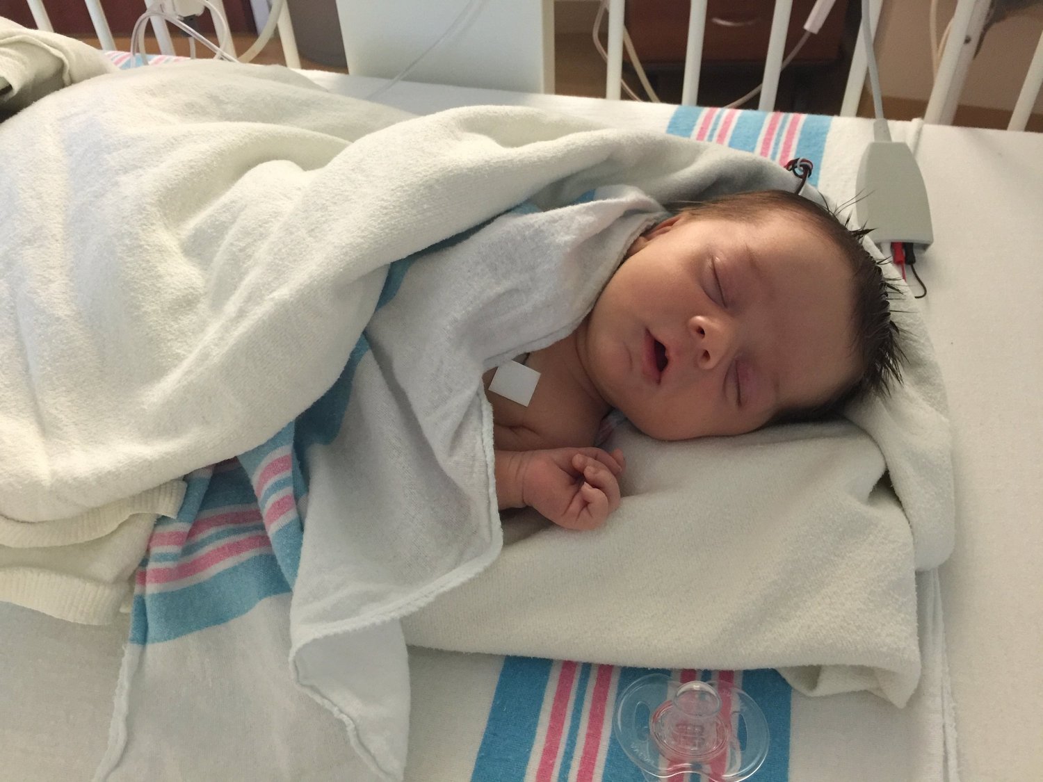 Mary as a newborn in the hospital, receiving treatment