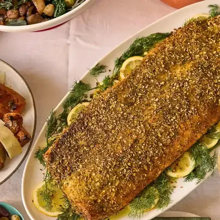Spice-crusted side of salmon with dill and lemon