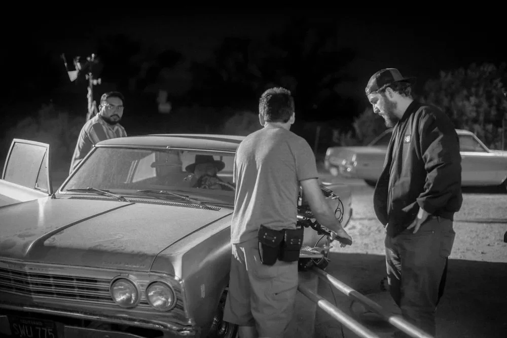 Director and crew block the nighttime car sequence