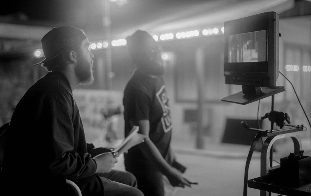 Director Wesley Hobbs watches playback at video village