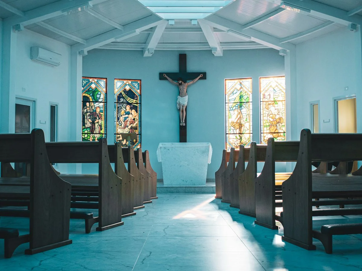 Wooden pews inside a small church