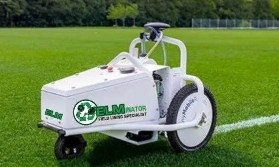 Elminator field lining machine parked on freshly striped grass field