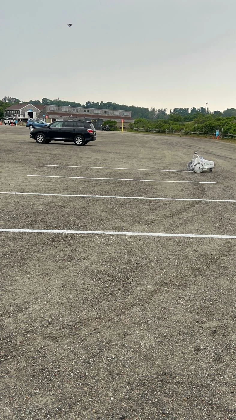 Elminator machine painting straight parking lot lines