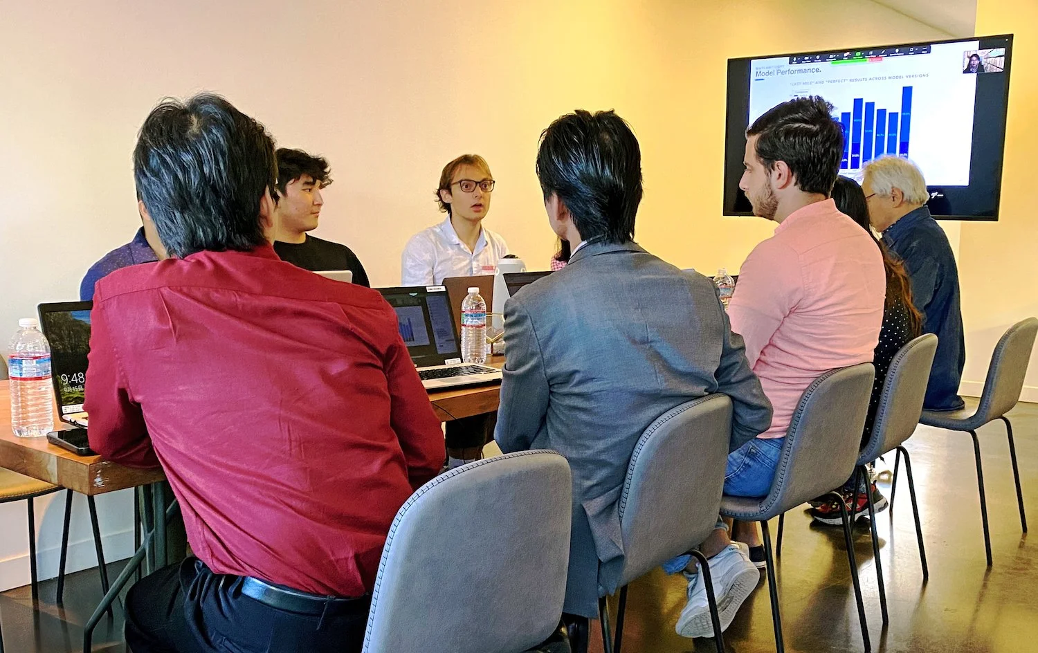 VALUENEX team members collaborating in the office
