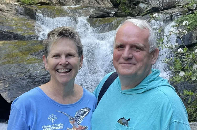 Julie and Michael McBride, outdoors.