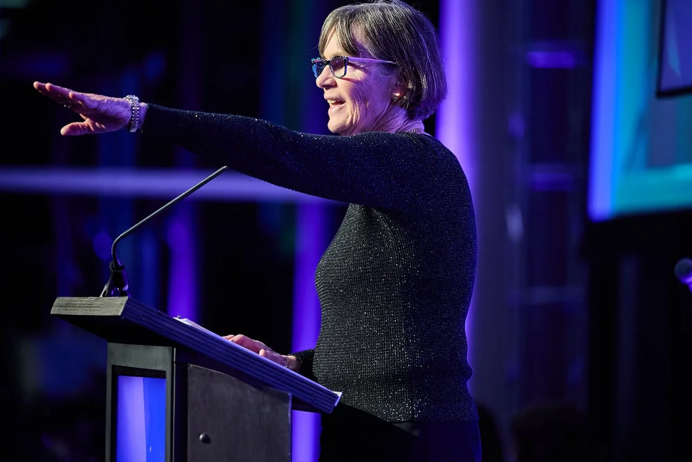 Keynote speaker Tara VanDerveer addressing the room at the Change Make*Hers Gala