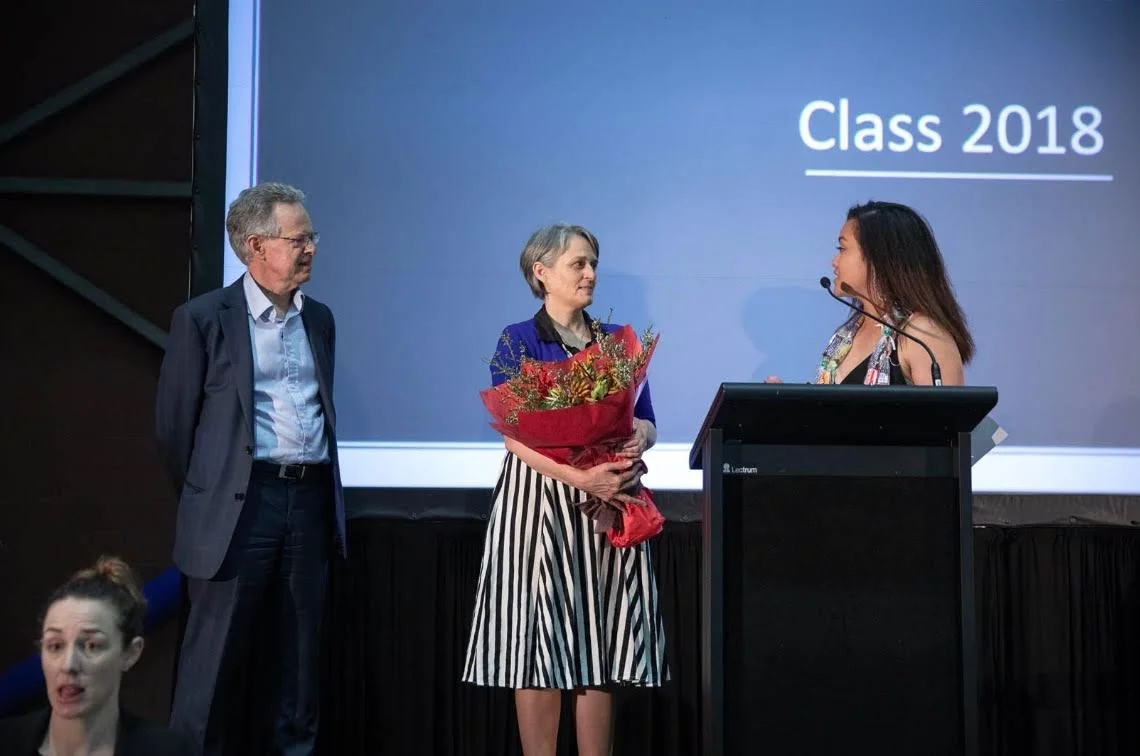 Mariana giving her graduation speech on stage in 2018