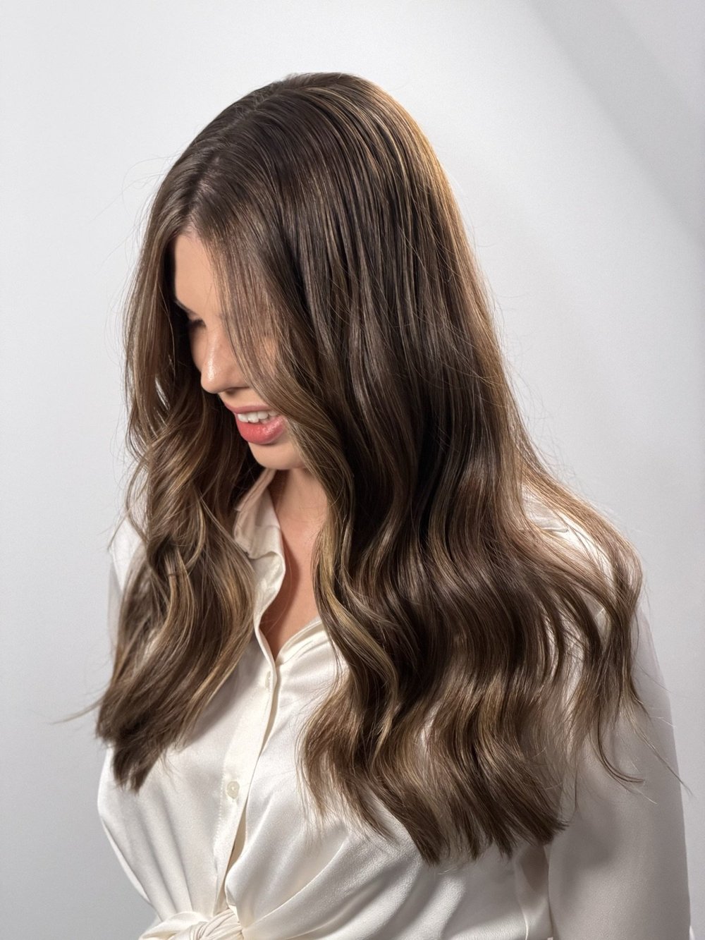 After: soft AirTouch babylights through dark brunette hair