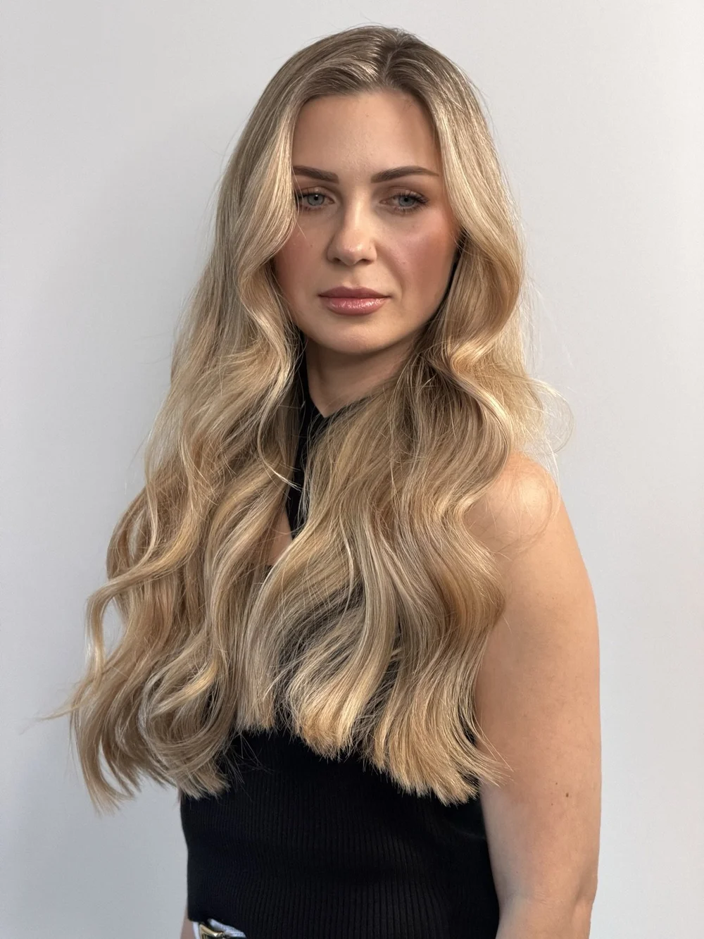 After: healthy, softly blended AirTouch blonde waves