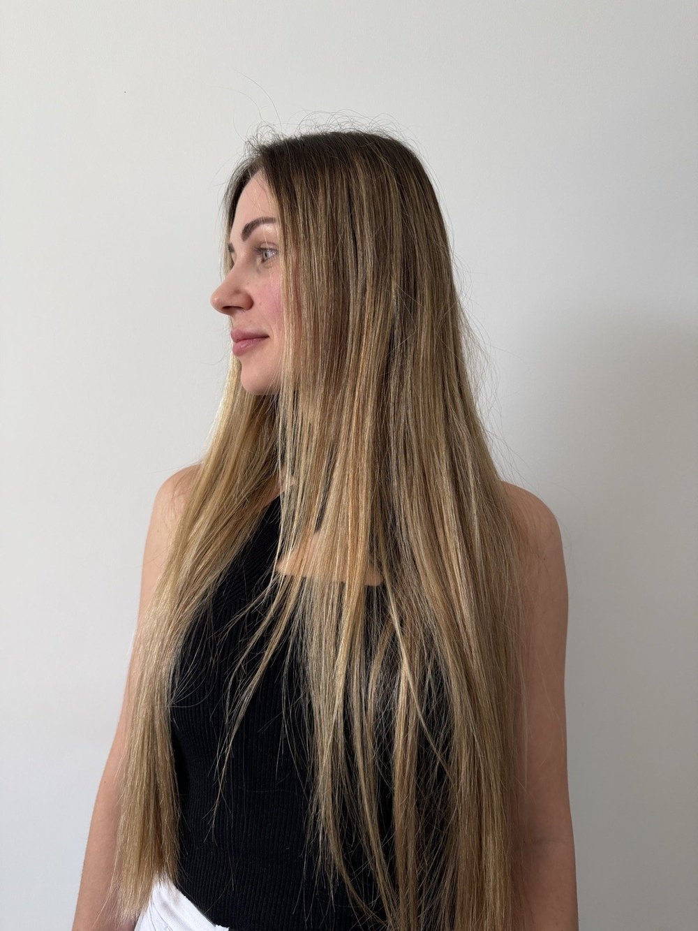 Before: long blonde hair with damaged, uneven colour