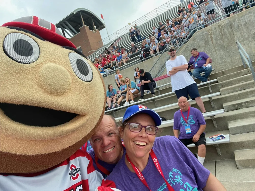 Flash fans with Brutus Buckeye in the stadium stands.