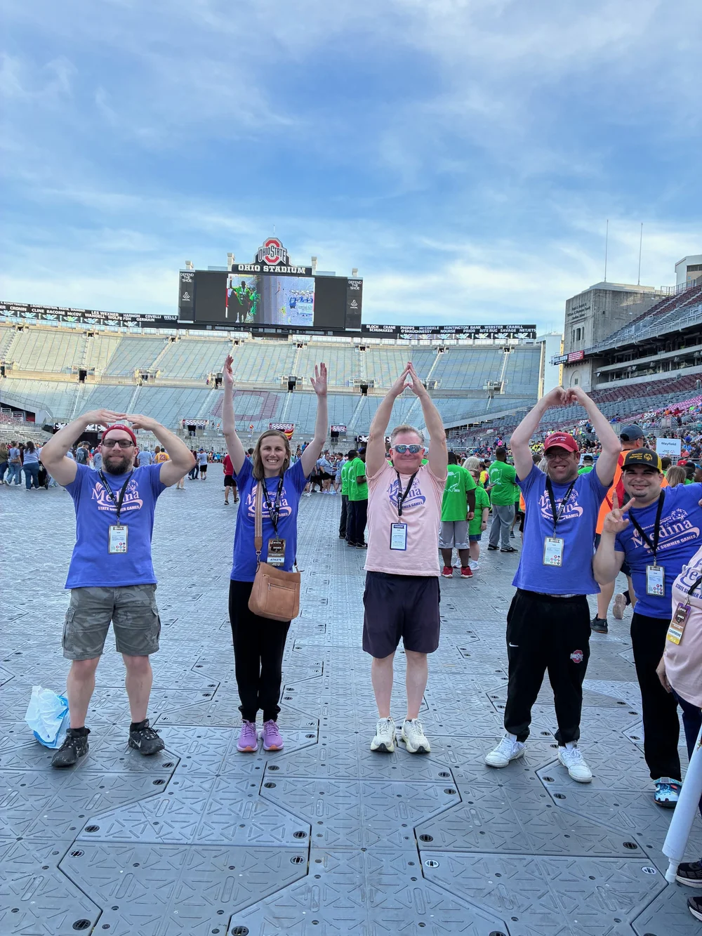 Flash teammates spelling O-H-I-O at the stadium.