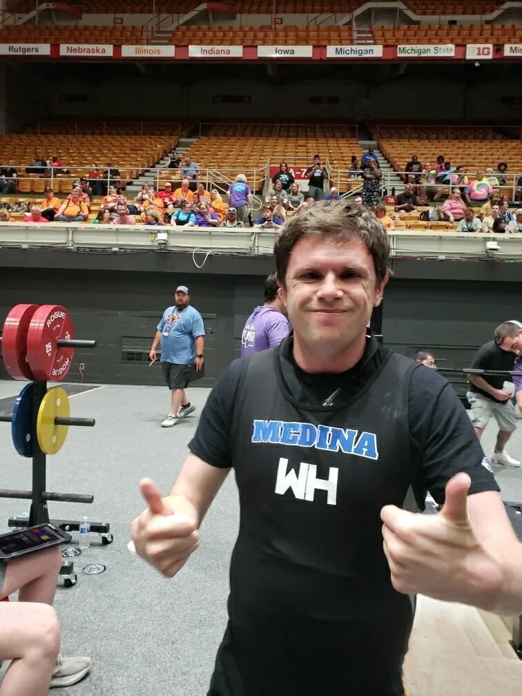 A Flash powerlifter at the bar in competition.