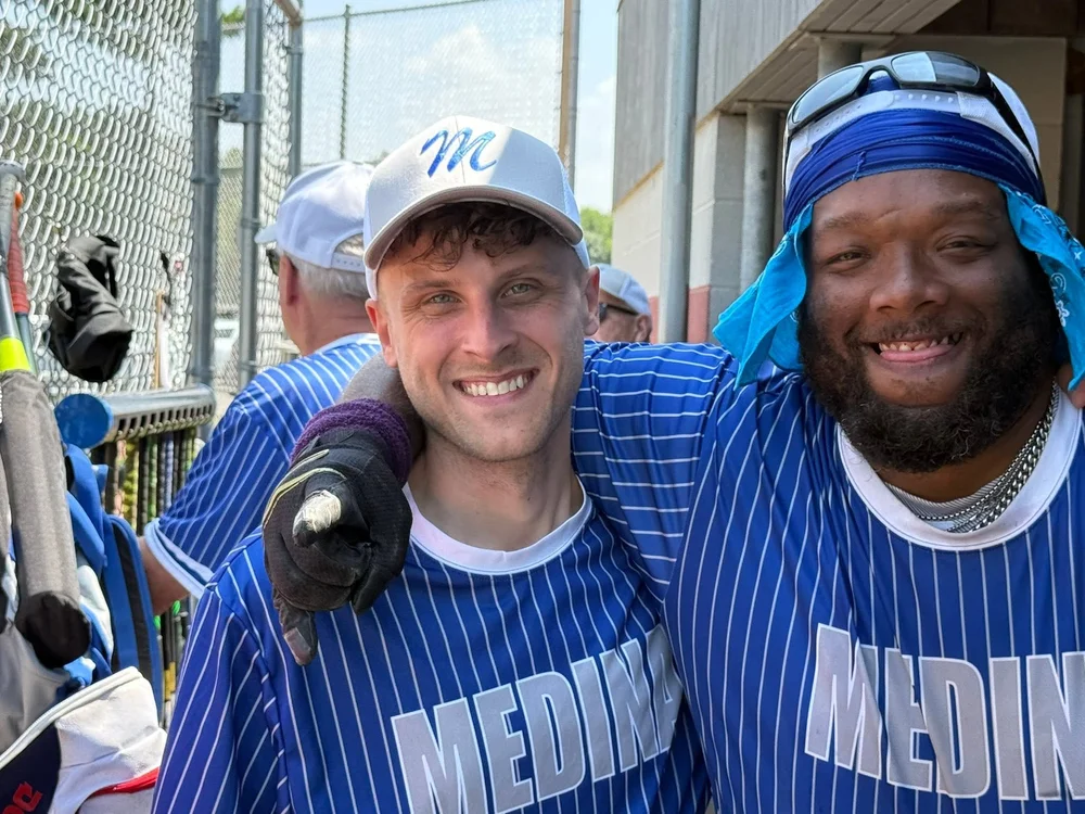 Two Flash baseball teammates in Medina pinstripes.