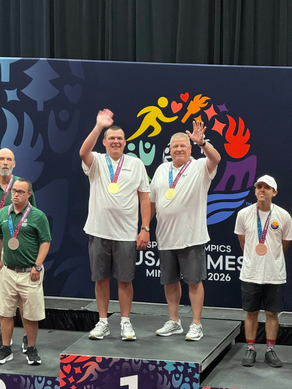 Flash medal winners celebrating.