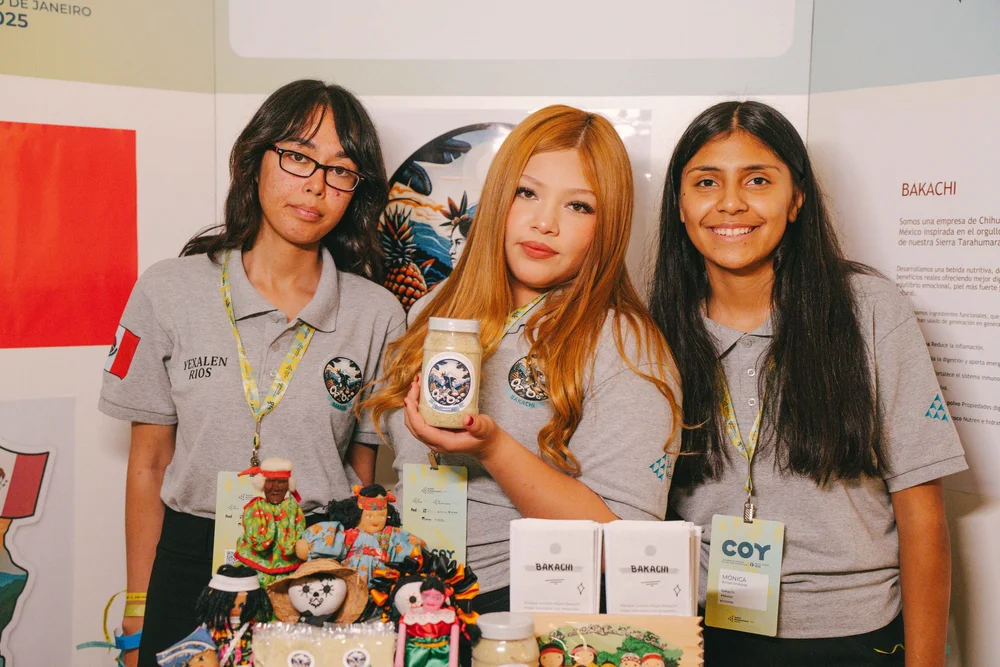 Student team at their stand with their product line