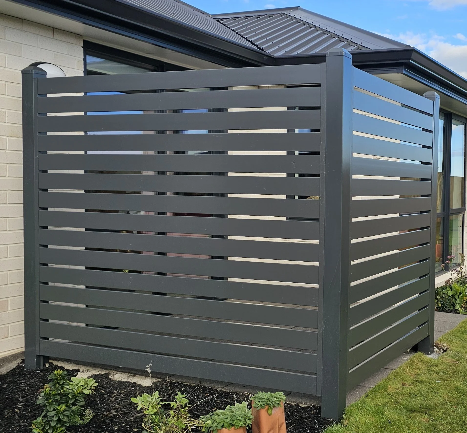 Modern aluminium privacy fencing installed by Hallmark Fencing