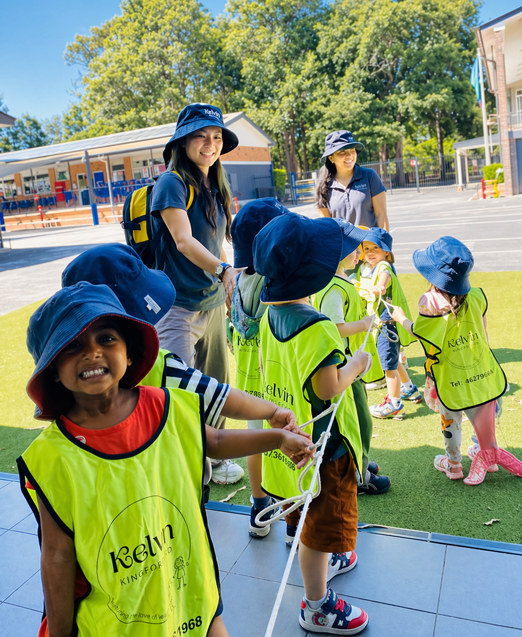 Children and educators learning together on an outdoor community excursion