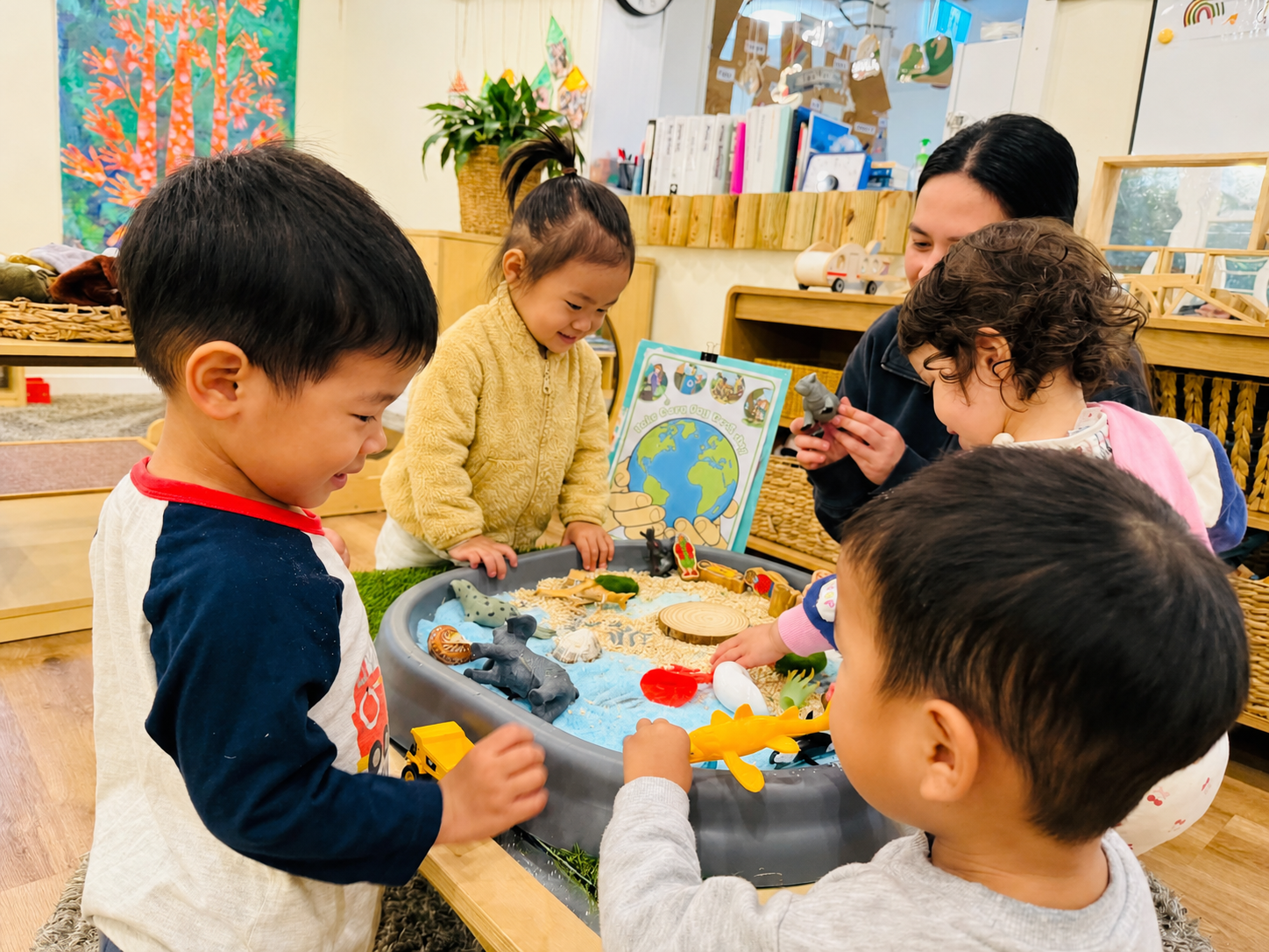 Preschool child investigating nature and science at Kelvin Kindergarten