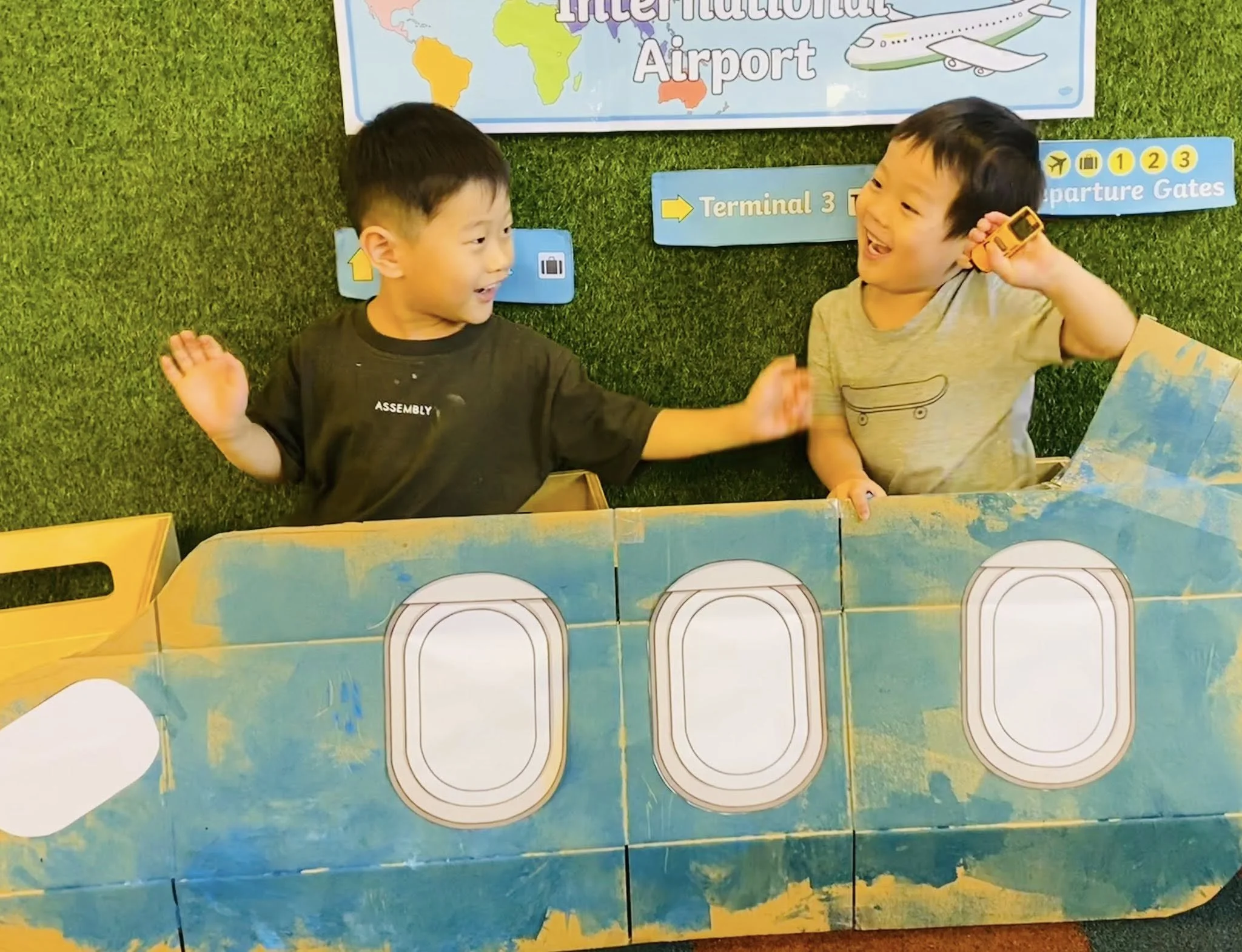 Children enjoying collaborative airplane pretend play at Kelvin Kindergarten St Ives