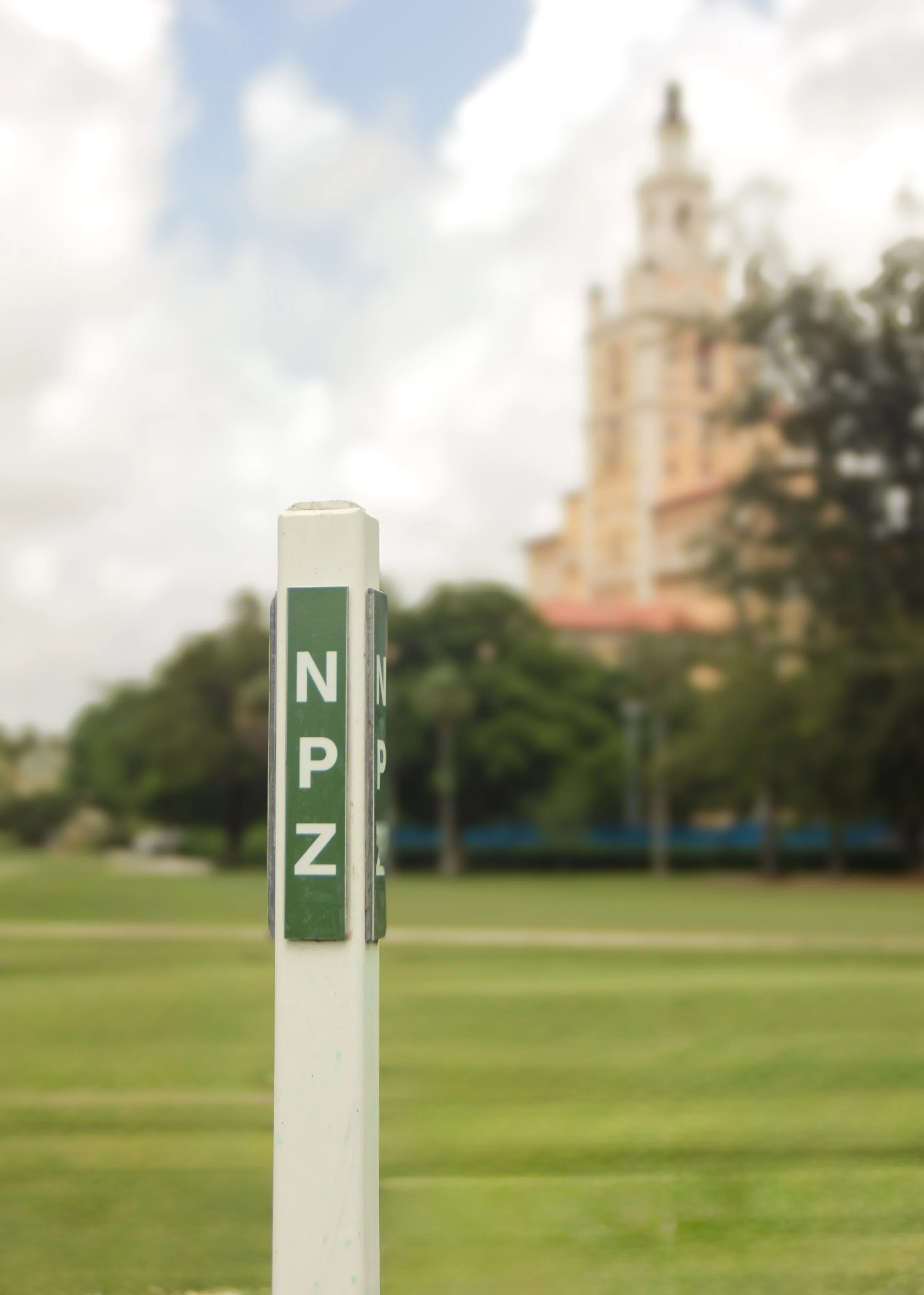 Branded golf course curb marker