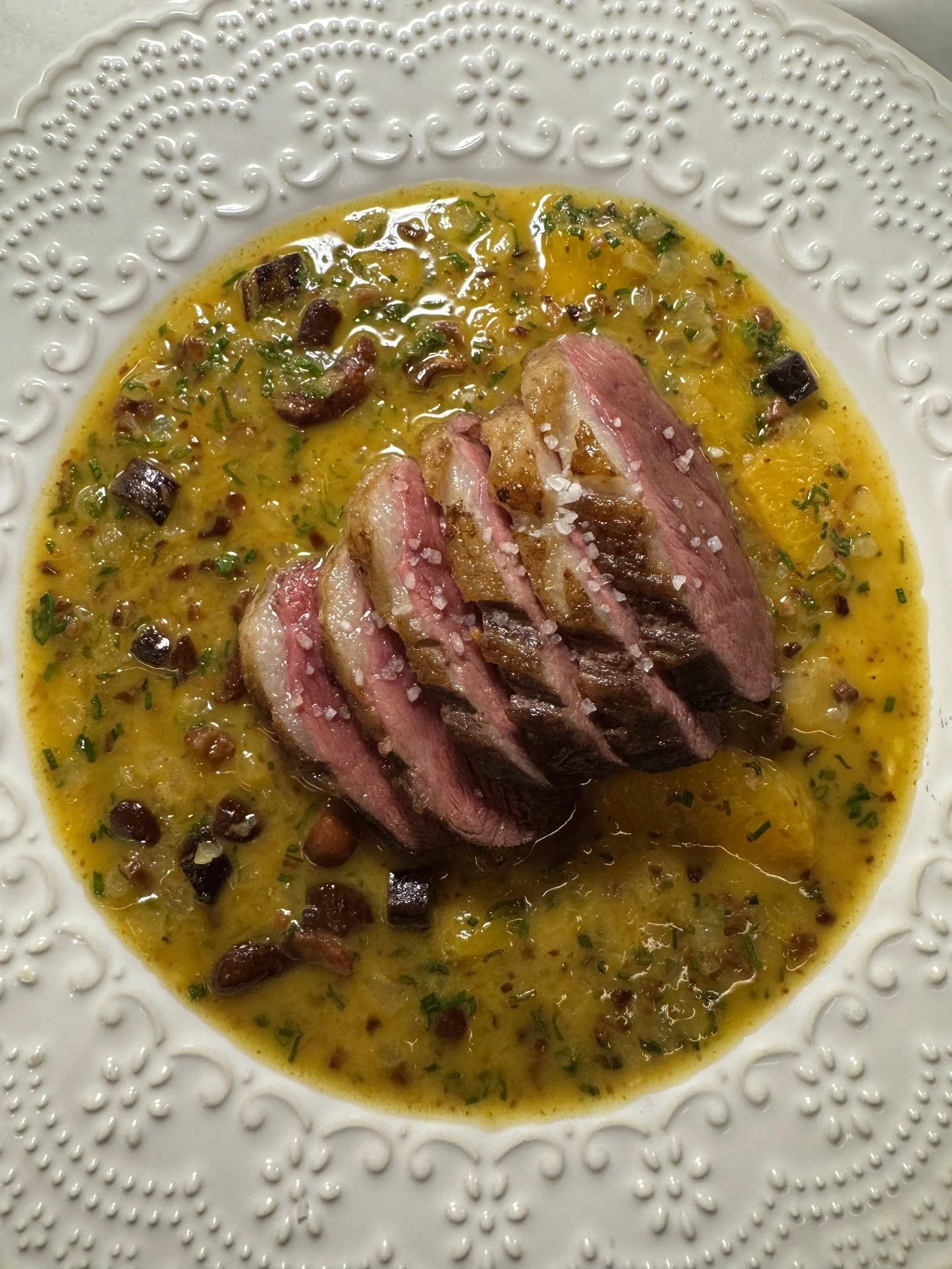 Duck a l'orange with hazelnuts