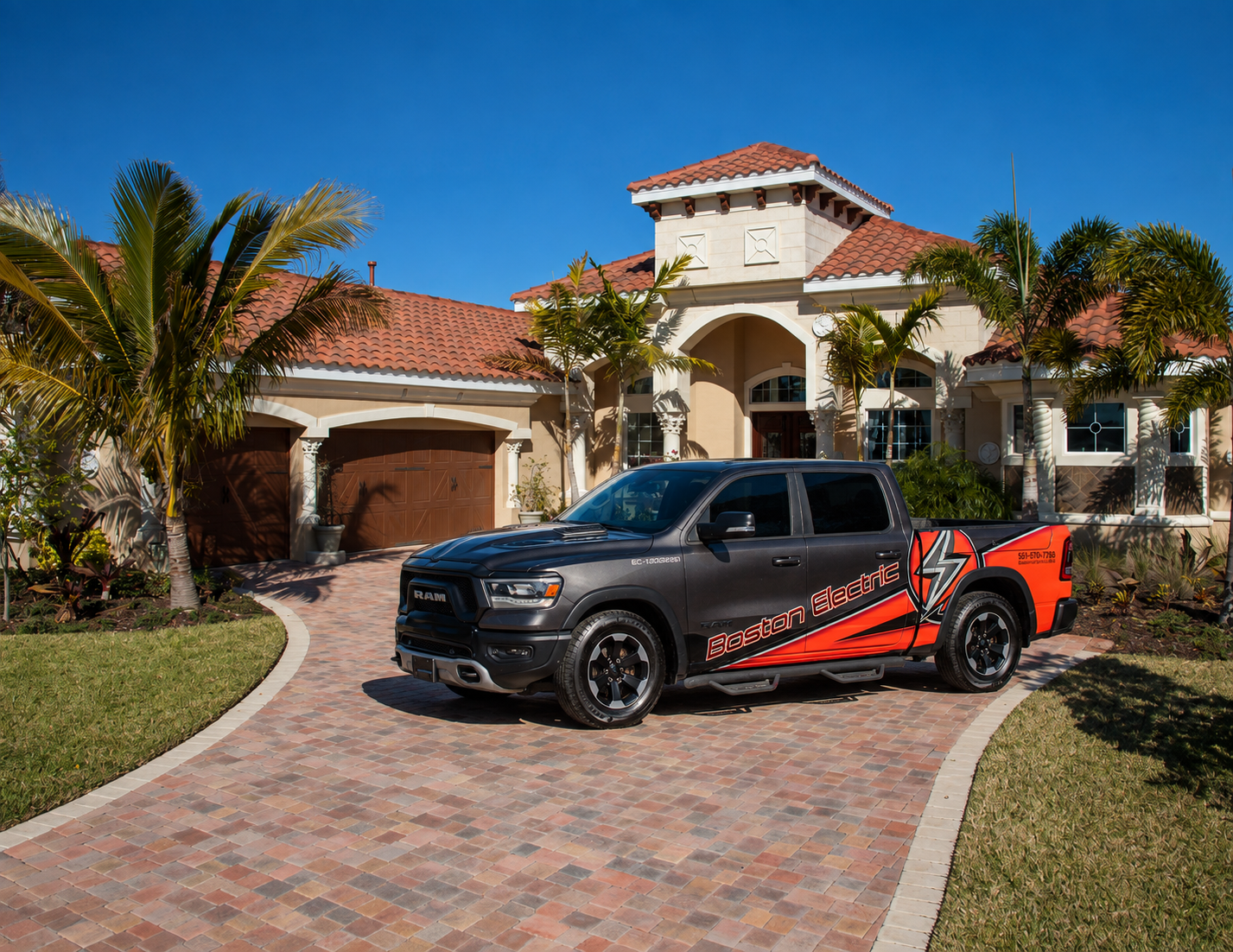 Boston Electric truck parked outside a home