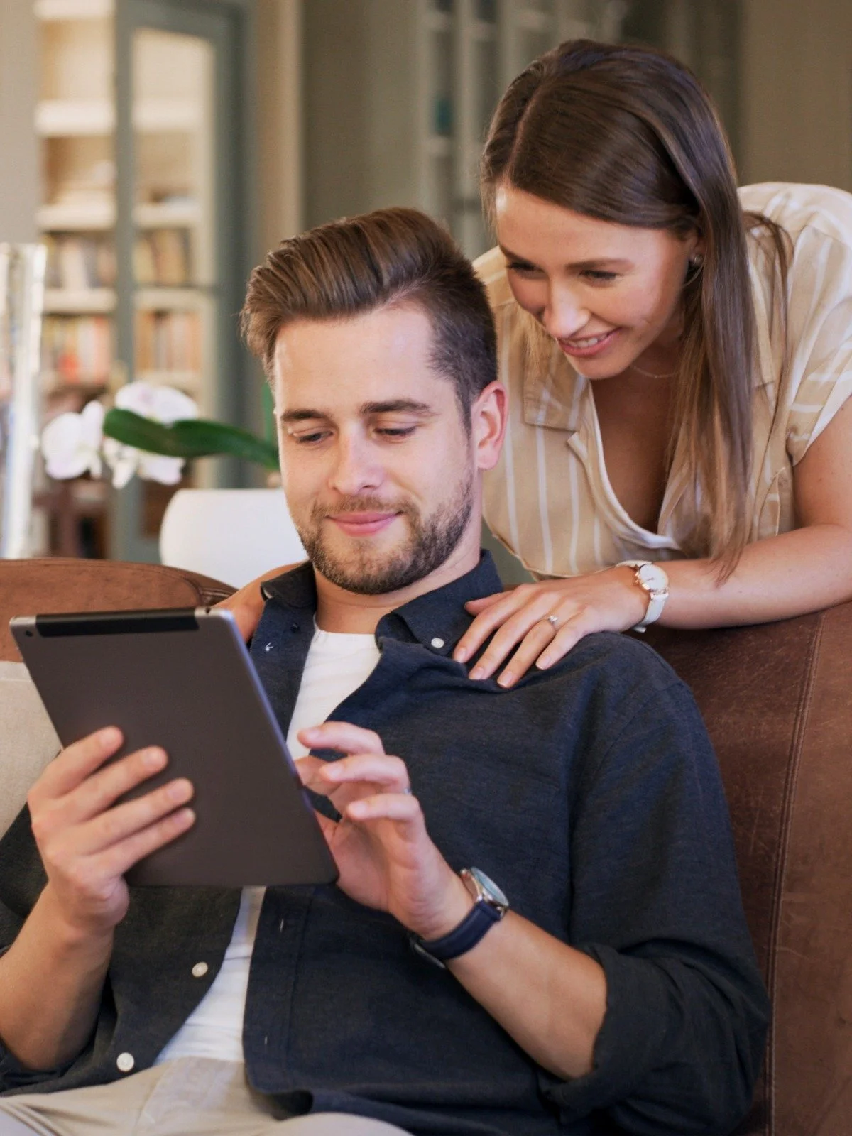 Homebuyers researching residential surveying services online