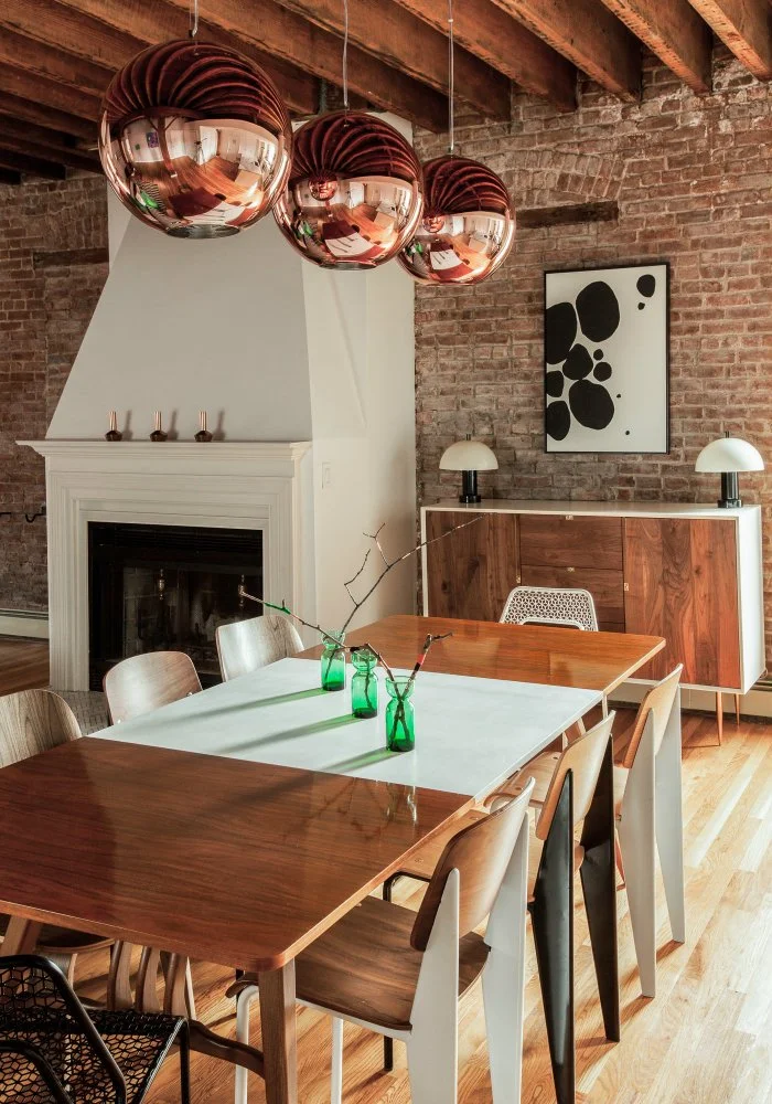 Jersey City Loft, dining room with copper pendants and walnut table