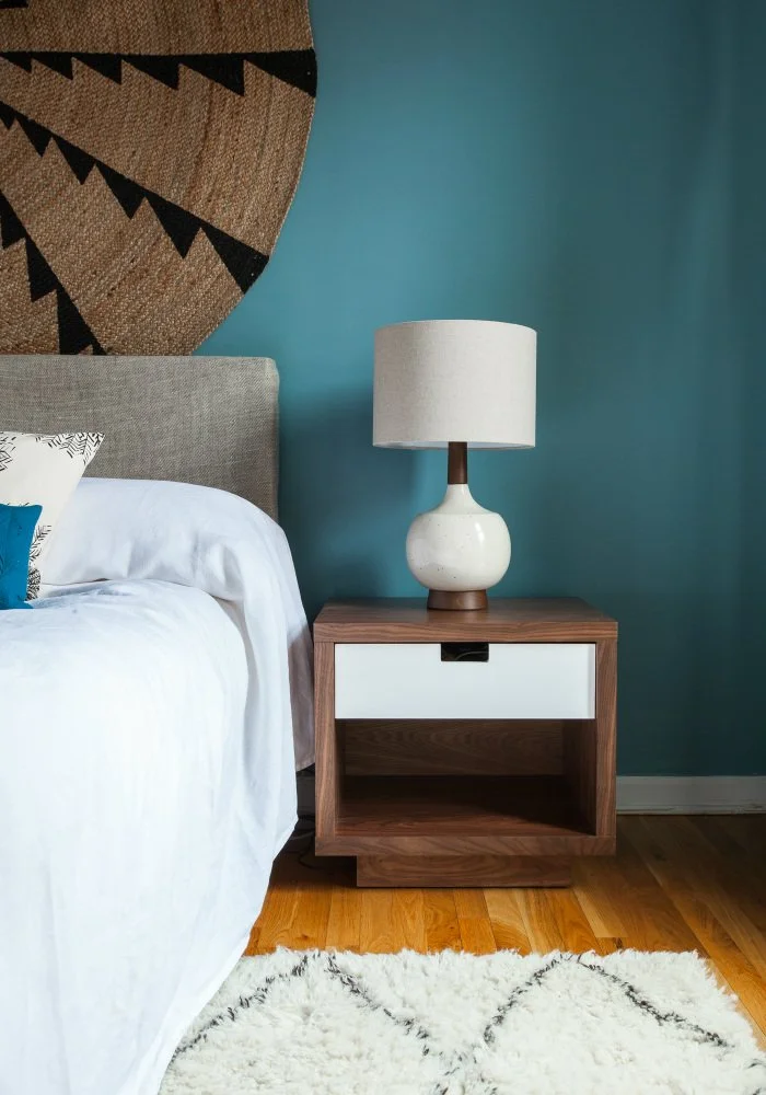 Jersey City Loft, blue bedroom with white walnut bedside table
