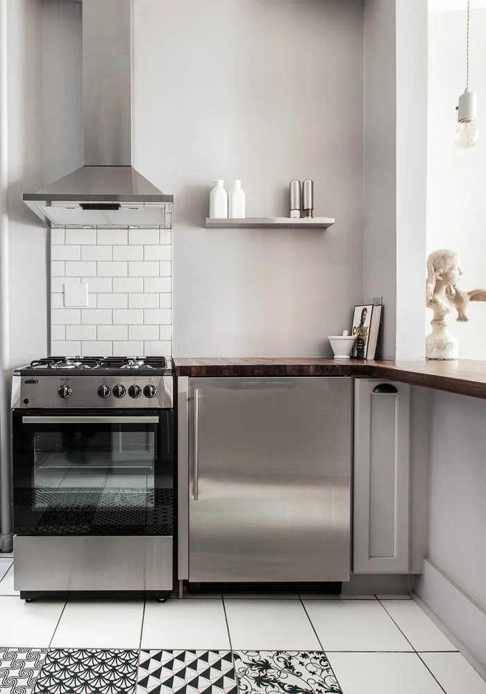Upper East Side Apartment, kitchen with black and white patchwork tiles