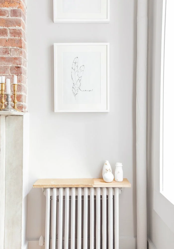 Upper East Side Apartment, black and white prints with golden accents