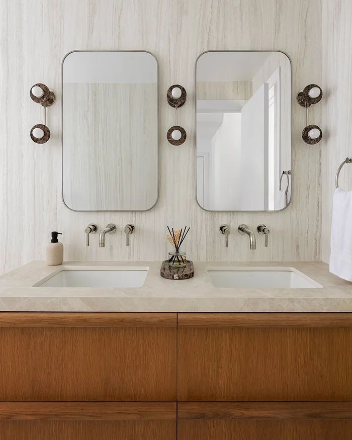 Modern double vanity bathroom, wall mounted faucets, marble countertop