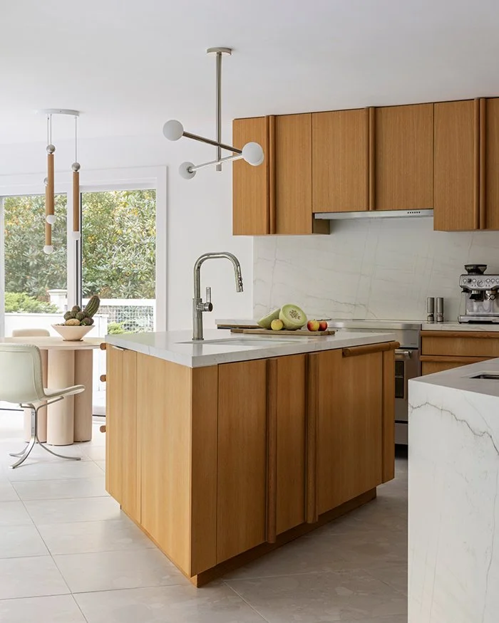Modern kitchen, custom oak cabinetry, marble waterfall island