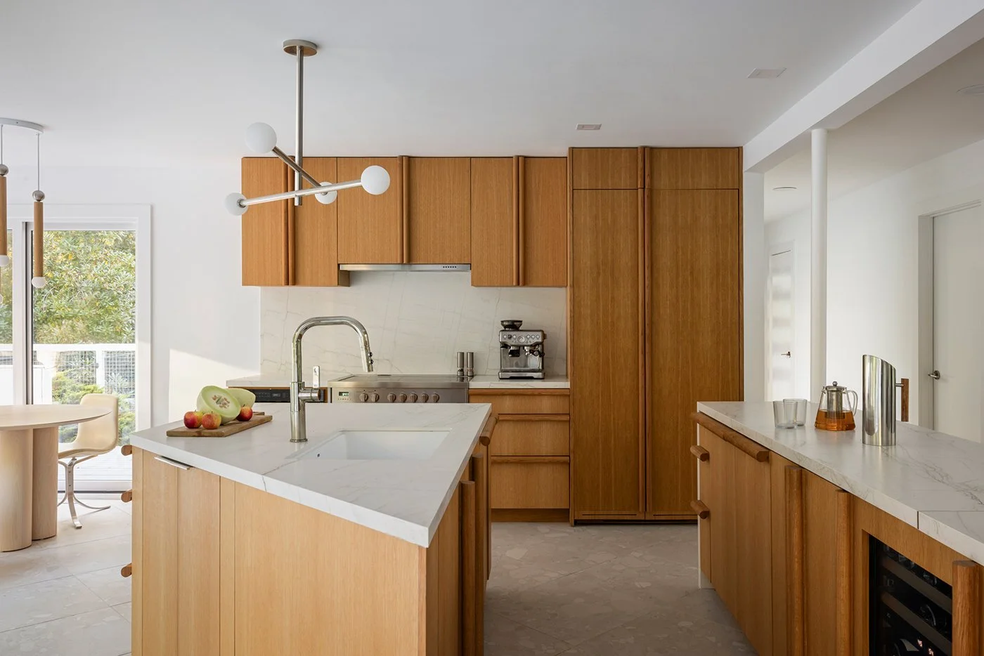 Modern kitchen, custom oak cabinets, double island, marble countertops