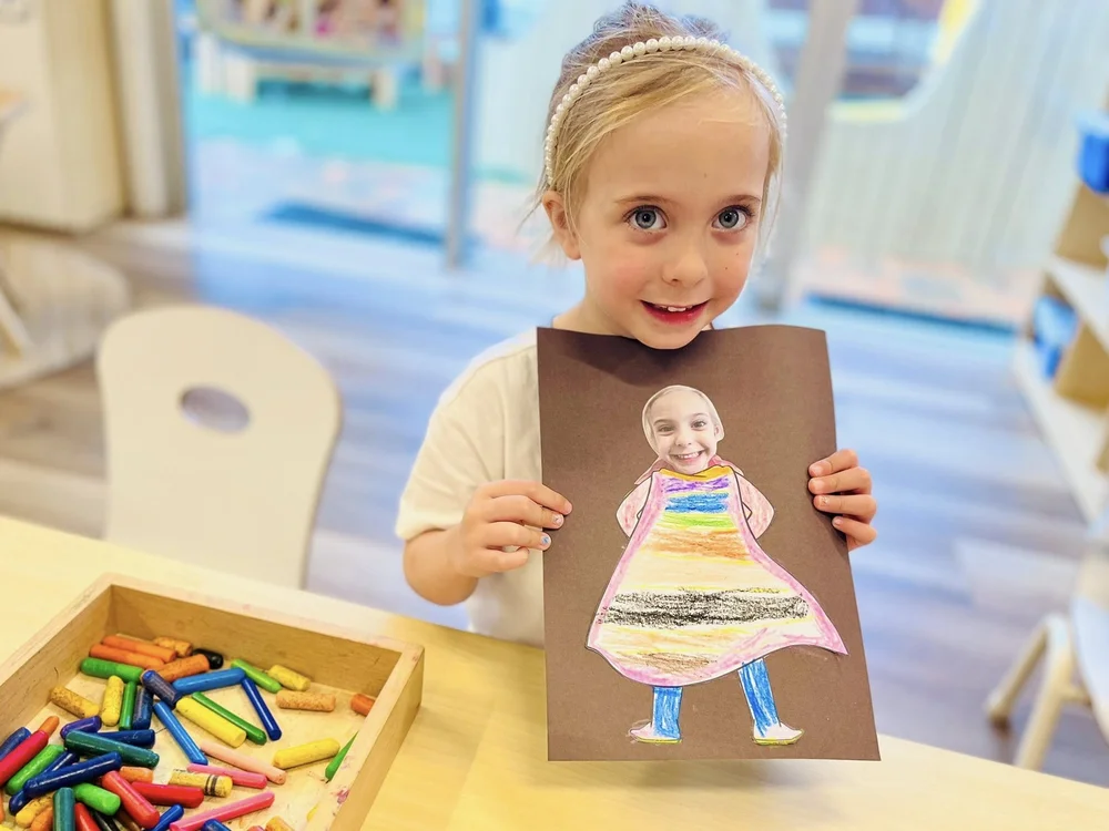 A child making her learning visible through artwork