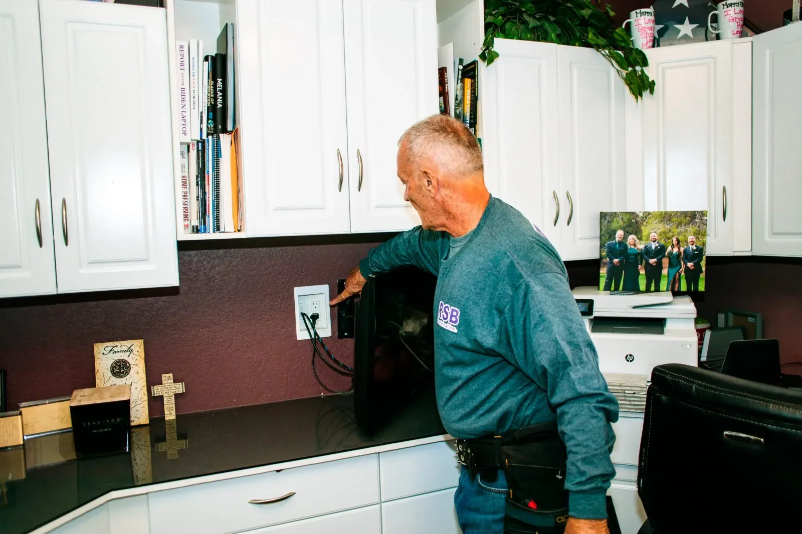 Electrician testing outlet home office — RSB Electrical, Mesa AZ