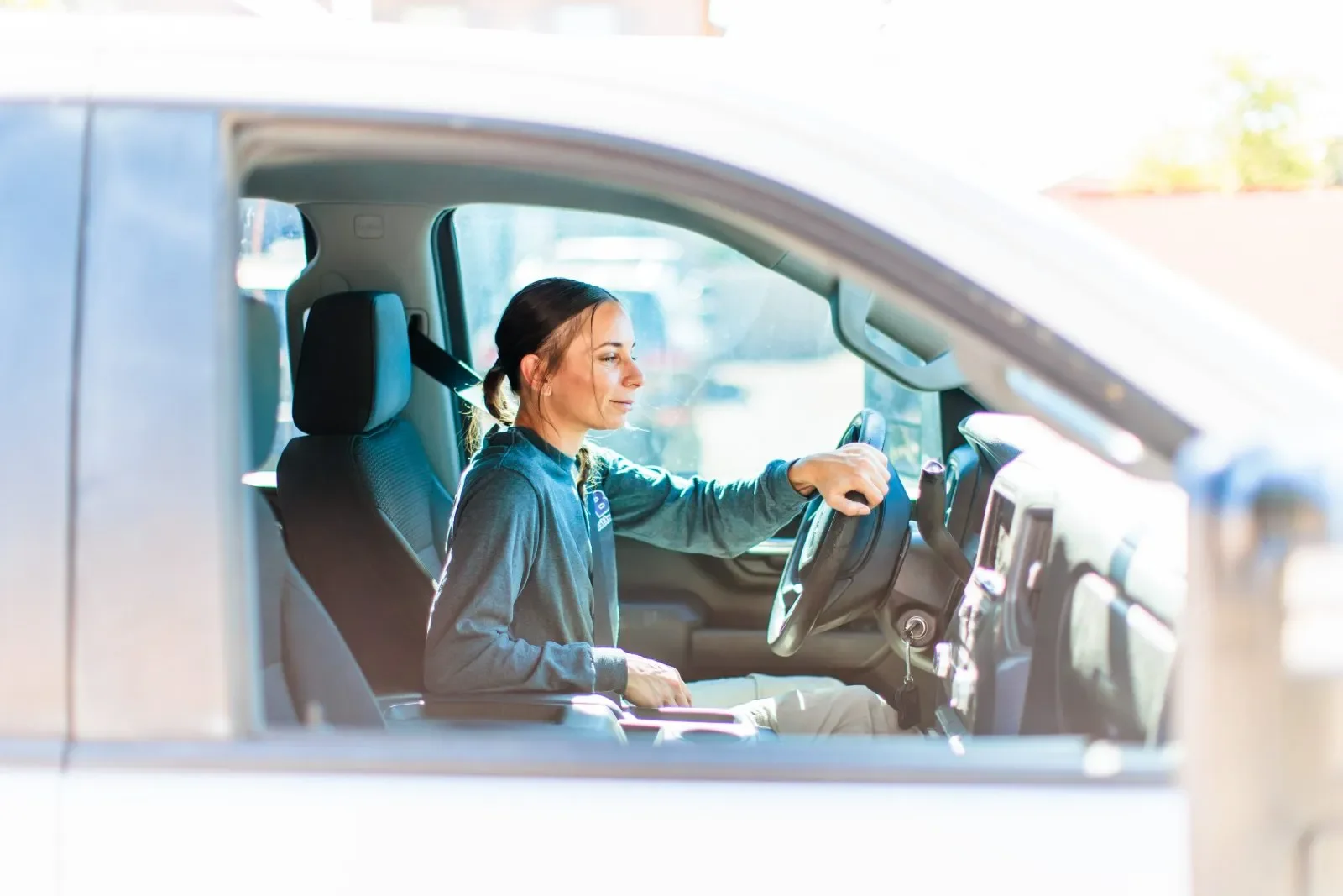 Sharee Blomquist driving service truck — RSB Electrical, Mesa AZ