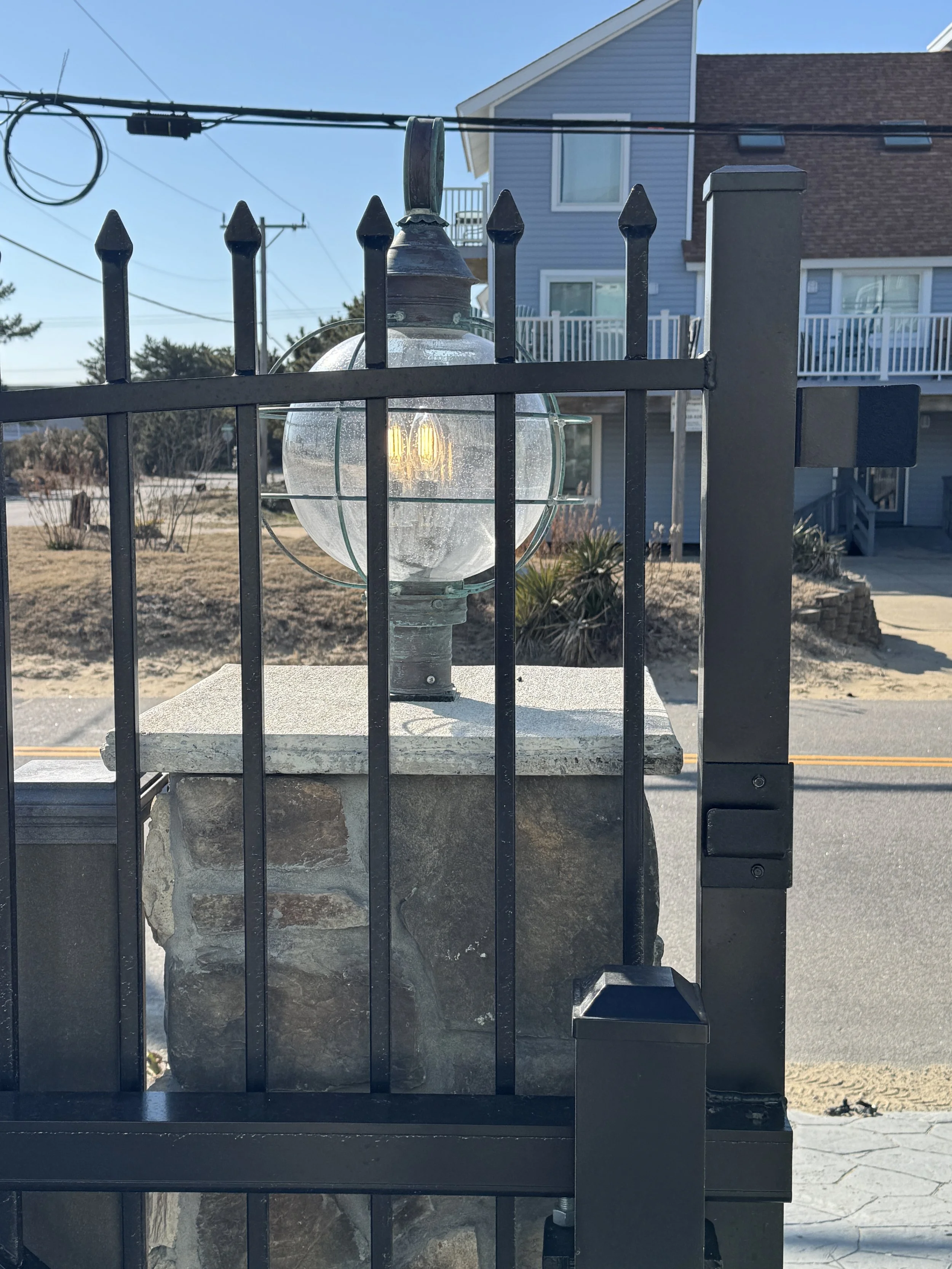 Lantern on a pier at a driveway gate in Suffolk, VA