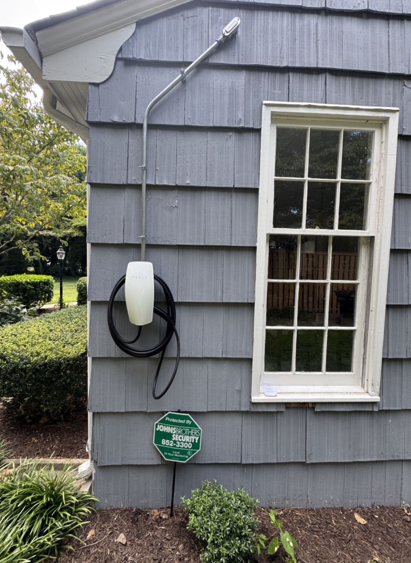 Level 2 charger working on the outside wall of a Portsmouth, VA home