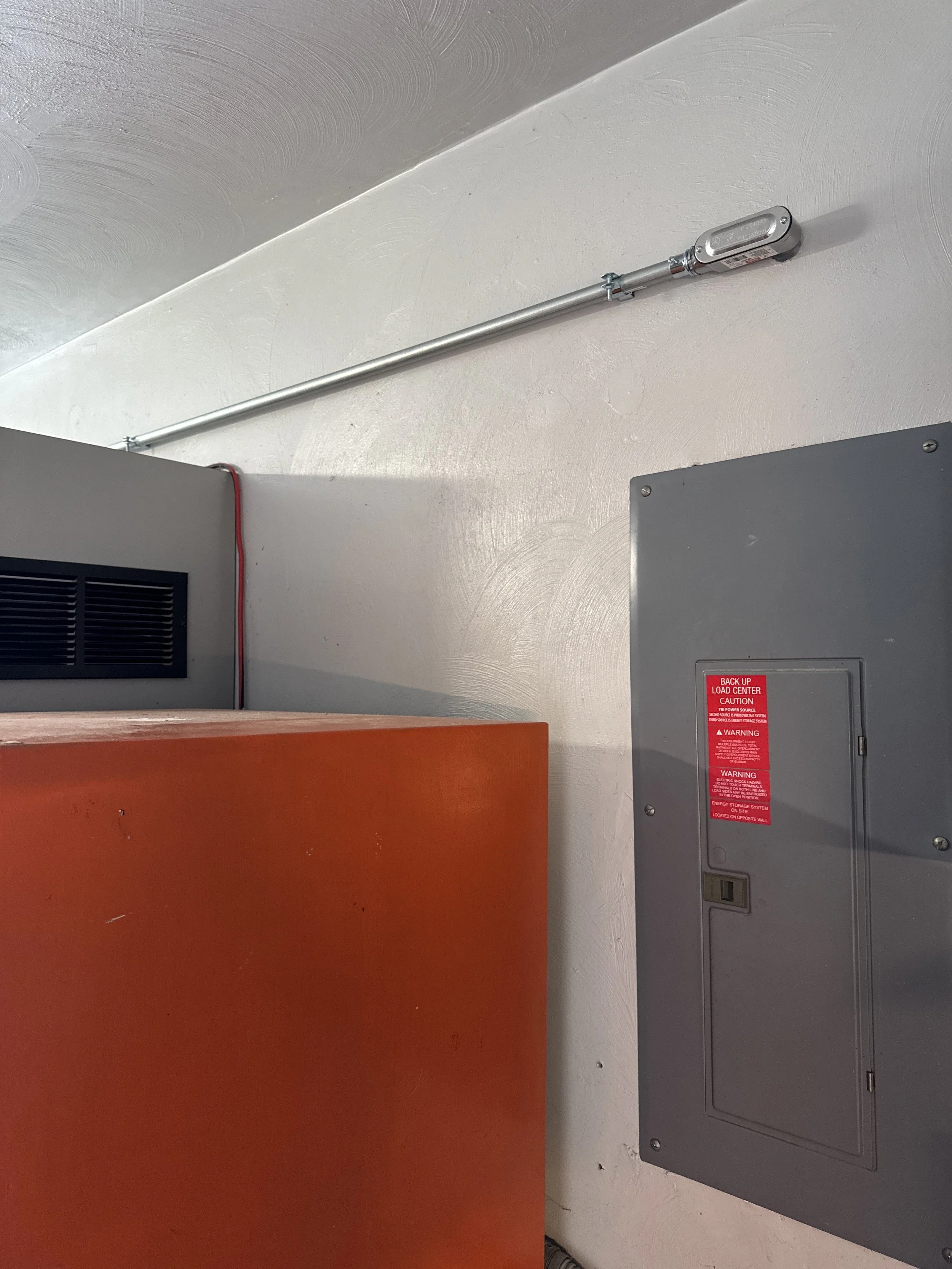 Electrical panel in the corridor of an existing Norfolk building