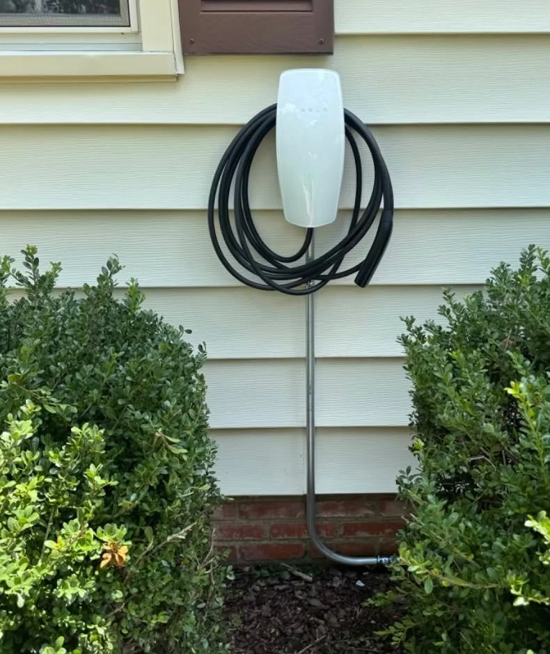 Level 2 charger installed on a Suffolk, VA home with the circuit run brought up the wall